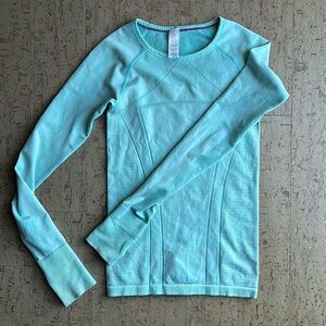 Used ivivva long sleeve fly tech shirt, size small